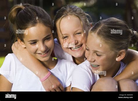 Close Up Of Three Girls Smiling Stock Photo Alamy