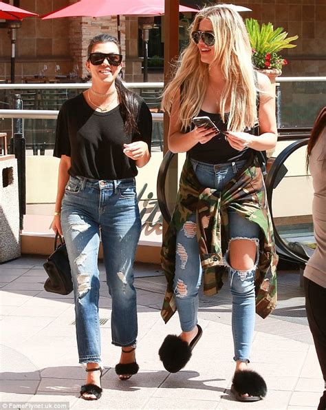 Kourtney And Khloe Kardashian Wear Matching Outfits As They Ride A