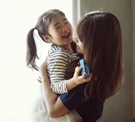 Download Premium Image Of Cheerful Japanese Mother And Daughter 11349