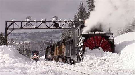Watch Union Pacifics Massive Rotary Snow Plow Train Blast Through The