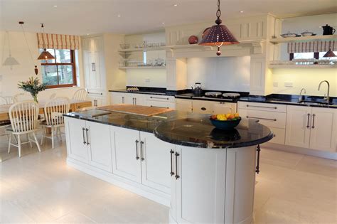 Dinning furniture white kitchen cabinets with colored. How to take advantage of a large space - James Mayor