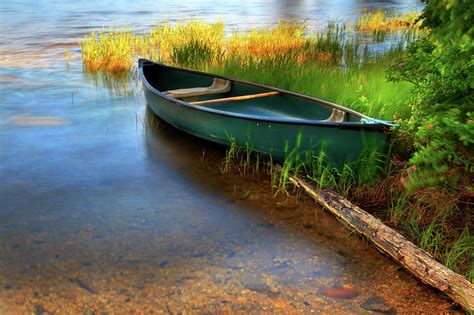 Lone Canoe Moored On Shores Of Upper By Anna Gorin