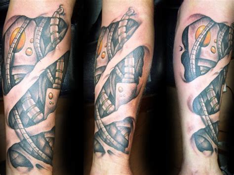 They are of course the easiest to cover over, but still look cool when you have them on display. 40 Insane Mechanics Tattoo Designs