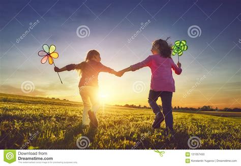 Children Are Playing On Meadow Stock Photo Image Of Inspiration