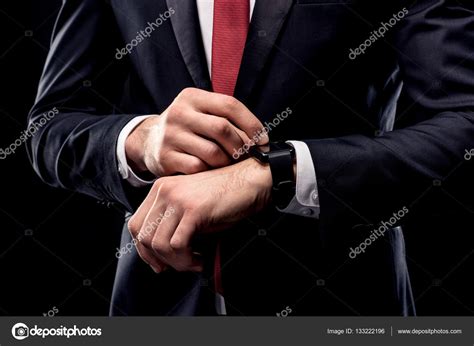 Businessman Checking Smartwatch — Stock Photo © Dmitrypoch 133222196