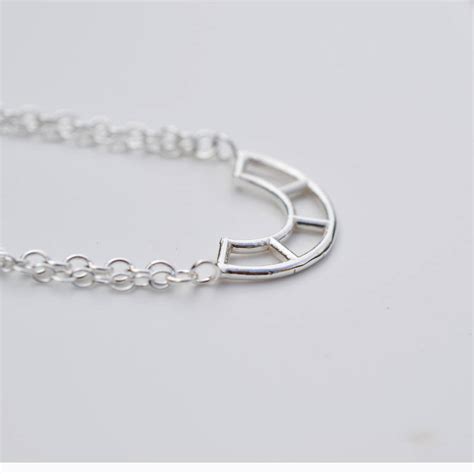 Tiny Silver Four Curve Pendant By Kate Holdsworth Designs