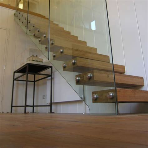 Interior Glass Wall Railing Floating Staircase With Wooden Steps Design