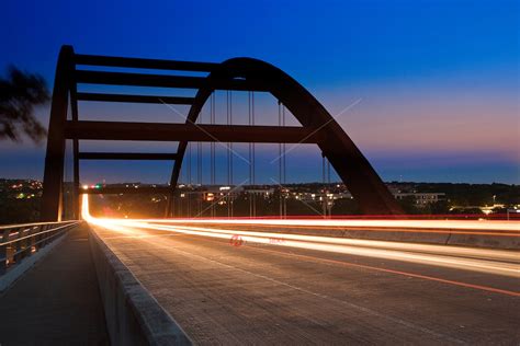 Cars Leave Light Trails As The Speed Through The Loop 360 Pennybacker