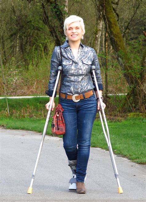Woman Amputee On Crutches