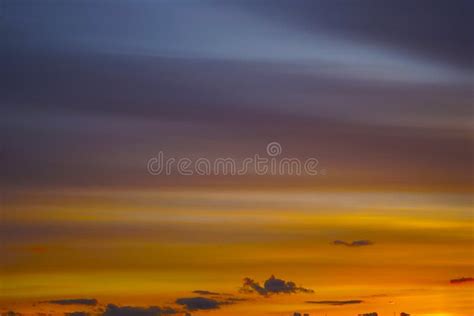 Blue Sky With Clouds At Sunset Bright Orange Golden Sunset Stock Image