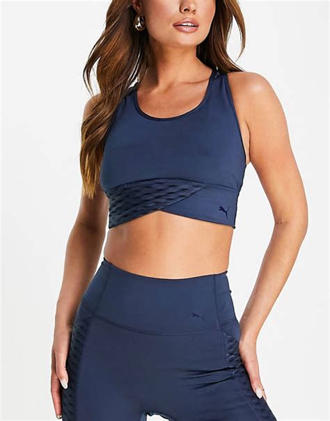 Puma Training Flawless Mid Impact Bra In Blue Asos