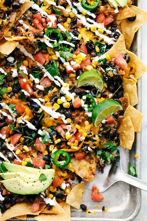 Serve the nachos hot from the oven along with sour cream and other condiments, as desired. Oven Baked Sheet Pan Nachos Recipe | The Recipe Critic