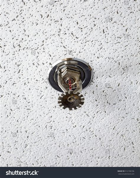 A fire sprinkler system is a simple, but key, active component of a domestic or commercial building's fire protection system. Ceiling Mounted Fire Sprinkler Modern School Stock Photo ...