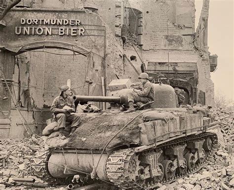 The American Tank Crew Of An M4 Sherman Takes A Short Battle Break