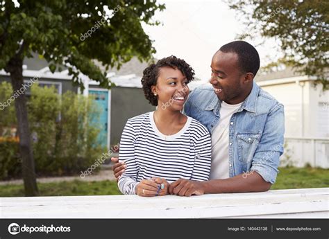 African American Couple Hugging — Stock Photo © Monkeybusiness 140443138