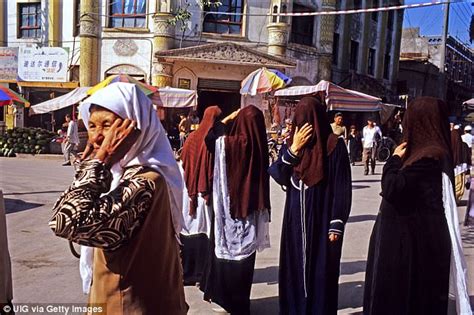 china bans abnormal beards and wearing veils in xinjiang daily mail online