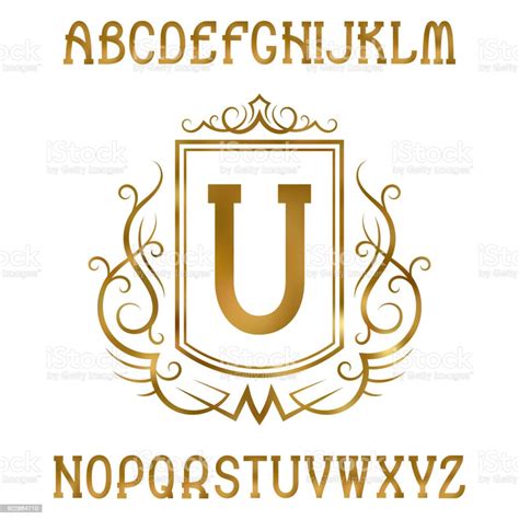 Golden Letters With Initial Monogram In Coat Of Arms Form Shining Serif