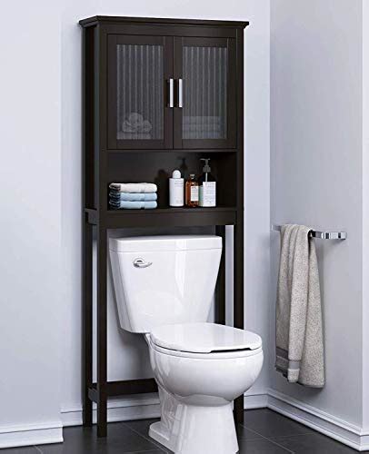 White and gray bathroom features a white vanity accented with raised panel doors topped with gray natural stone counters which extend over the toilet creating a slim shelf to hold bath products under a full length framed mirror. Spirich Bathroom Shelf Over The Toilet, Bathroom Cabinet ...