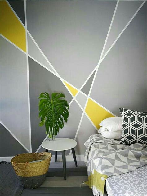 Since the bed is the most prominent furniture in a bedroom, the wall over it serves as a focal point. Peinture géométrique | Accent wall bedroom, Geometric wall ...