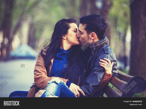 Couple Kissing Bench Image And Photo Free Trial Bigstock