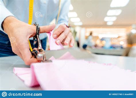 Tailor Cutting Fabric With Scissors Stock Photo - Image of fabric ...