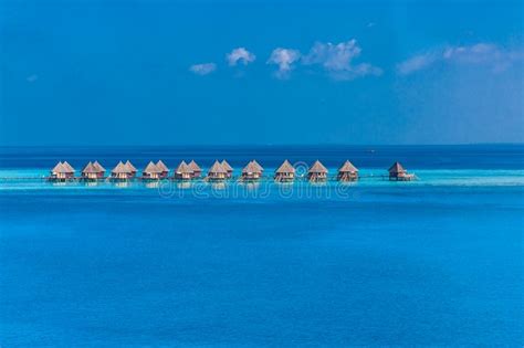 Luxury Resort Island In Maldives With Water Bungalow Background And