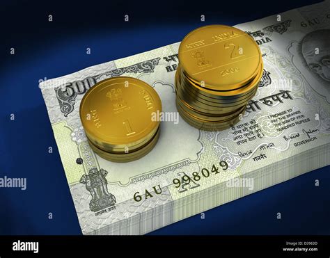 Bundle Of Indian Currency Notes With Stack Of Coins Stock Photo Alamy