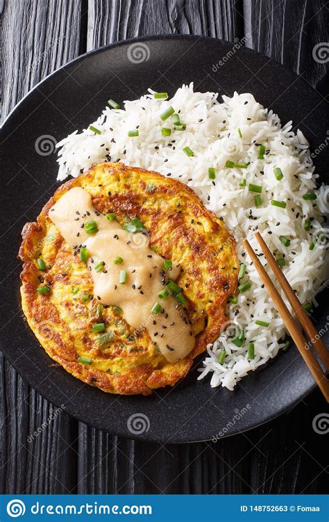 Egg foo young is a chinese indonesian omelet, normally prepared with mixed vegetables and poultry or ham. Chinese Omelette Egg Foo Young Served With Rice Close-up ...