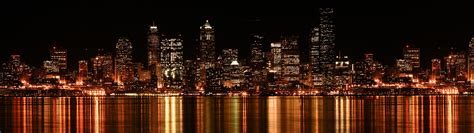 City Buildings During Night Time Hd Wallpaper Wallpaper Flare