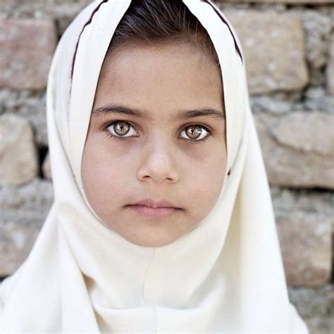 A Young Schoolgirl In Traditional Clothing From Herat Afghanistan