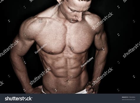 Fit Man Flexing His Muscles Stock Photo 57820804 Shutterstock