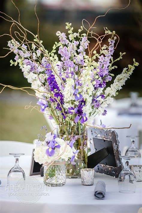 Terrarium wedding centerpieces are popular because they are soooo versatile. Purple Lavender and White Centerpiece: Mason jars of white ...