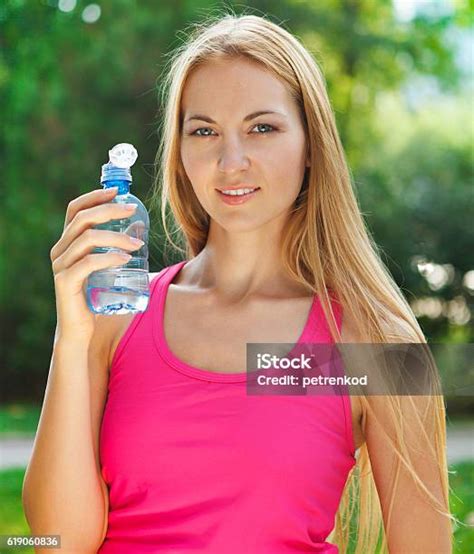 Woman Drinking Water After Fitness Exercise Stock Photo Download