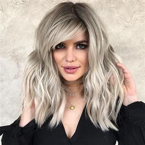 25 Mid Length Blonde Hairstyles To Show Your Stylist Pronto Side Bangs Hairstyles Platinum