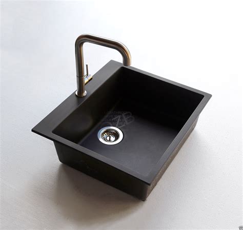 These bold matte black kitchen sink mixers display elegance and stability which is essential to every kitchen. Black Cube quartz stone laundry trough kitchen sink tap faucet