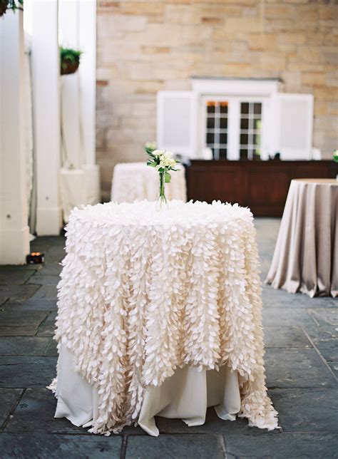 These spandex linens are made from spandex table linens are available in 14 different colors and many different table sizes. Ivory Feather Linen Over Cocktail Table