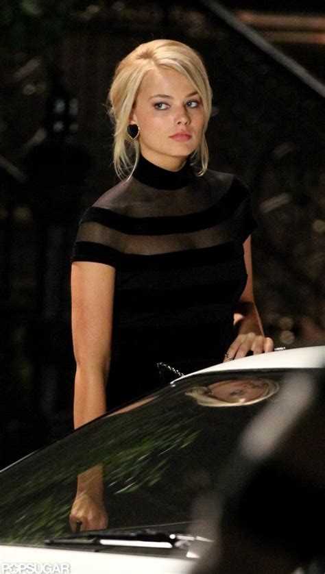 Margot Robbie Wore A Black Dress On Set Leonardo Dicaprio Spends A