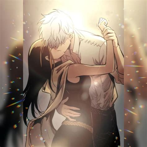 Two Anime Characters Hugging Each Other In Front Of Bright Lights And Sparkles Behind Them