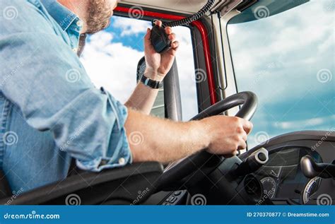 Professional Trucker Talking Via Cb Radio On The Road Stock Image