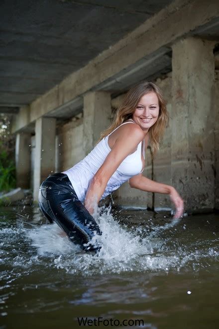 Hot Blonde Girl In Tight Jeans T Shirt And Shoes Get Soaking Wet In Lake Wetfoto Com