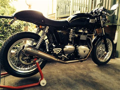 This 2:2 silencer from performance exhaust specialists arrow, features a brushed stainless steel body with carbon end cap. Triumph Scrambler Arrow 2 Into 1 Exhaust | Reviewmotors.co