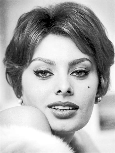 Contact me if there's a problem. Classify the Italian Sophia Loren