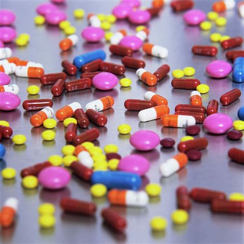 mixed pills photograph by mark thomas science photo library pixels