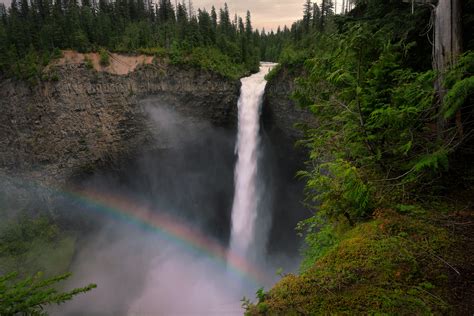 Helmcken Falls Delivering The Rainbow In The Pine Forests