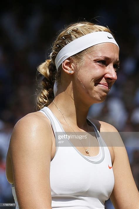 Runner Up Germanys Sabine Lisicki Holds Her Trophy And Reacts As She