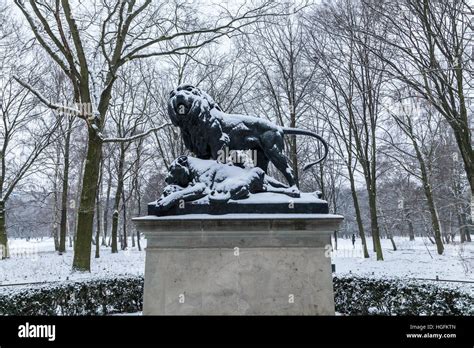 Lion Statue In Tiergarten Park In Winter In Berlin Stock Photo