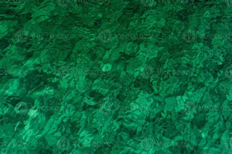 Green Abstract Texture Background Of Emerald Green Sea Water Top View