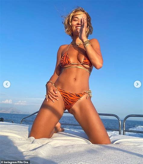 Rita Ora Sends Temperatures Soaring As She Showcases Her Figure While Posing In A Tiny Bikini