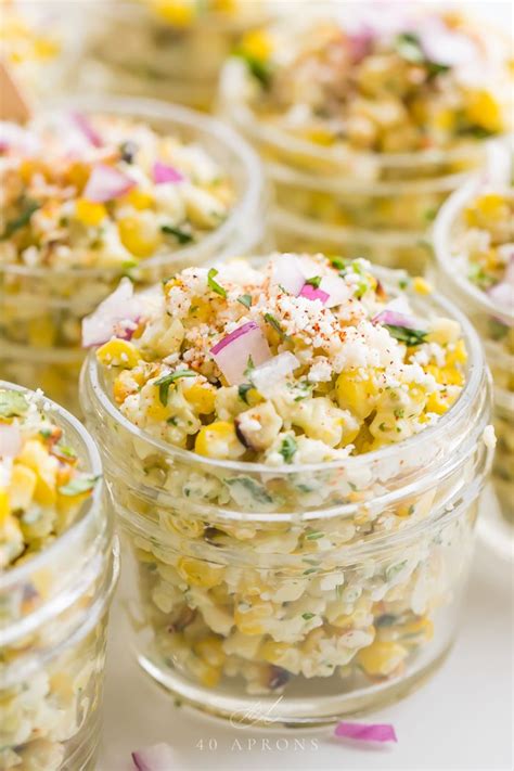 Lightly charred corn on the cob slathered in a creamy chili, lime sauce and topped with cilantro and cotija cheese is a great side to serve at any summer cookout. Mexican Street Corn Salad in Cups with Hatch Chiles (Esquites) | Recipe | Mexican street corn ...