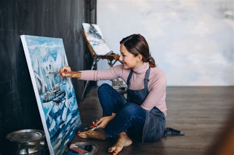 Free Photo Female Artist Painting In Studio